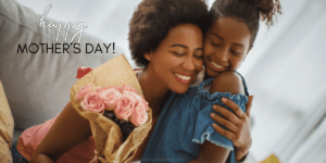 Black mother and daughter hugging. This is a banner image for post "Mother's Day gifts for stay-at-home moms she'll actually love"